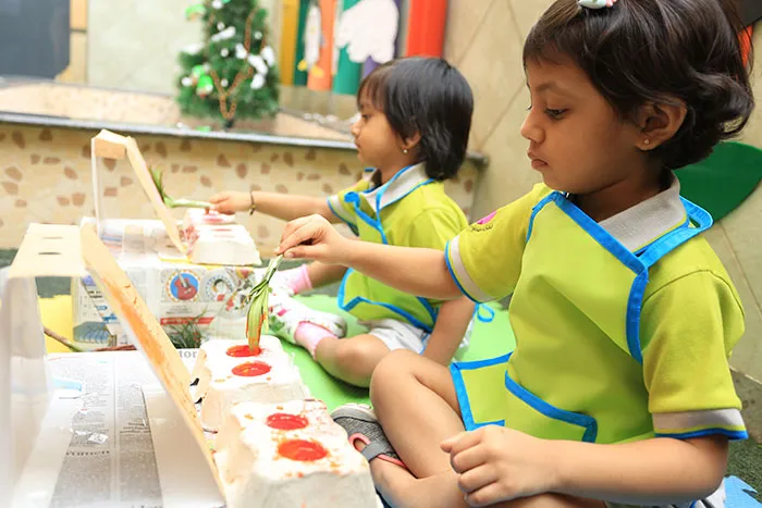 Pre-nursery children doing outdoor sensory play at Edistää Preschool, Wadala West, Mumbai